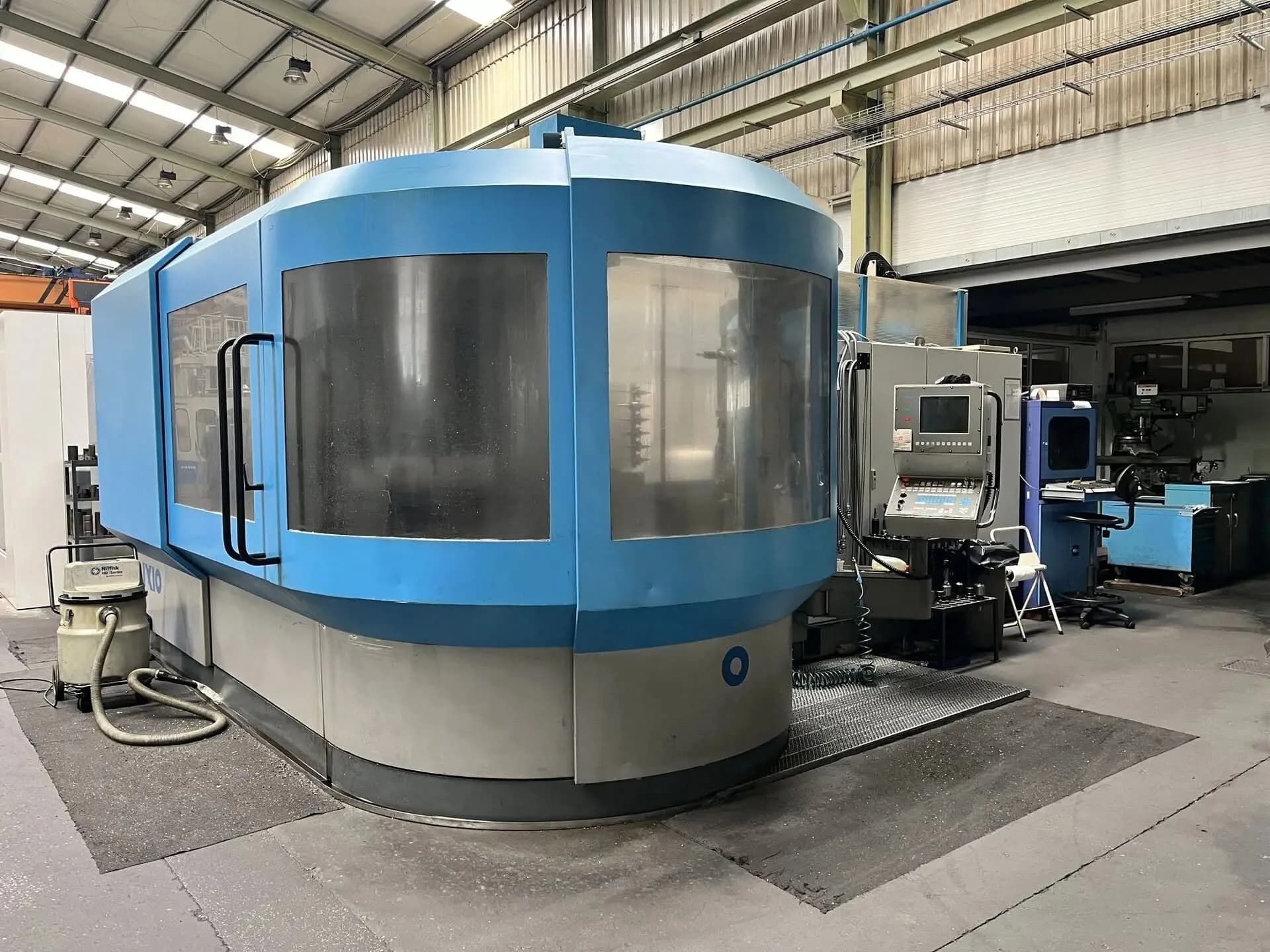 Mandriladora IXION CNC fechada, dedicada à furação de águas